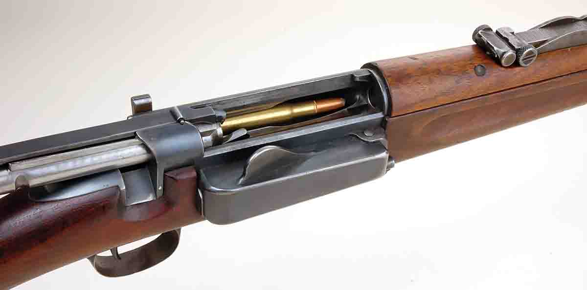 The U.S. Models 1892, 1896 and 1898 30 Army “Krags” fed through a magazine on the receiver’s right side with the cartridges passing under the receiver. Then they were fed into the chamber from the receiver’s left side.